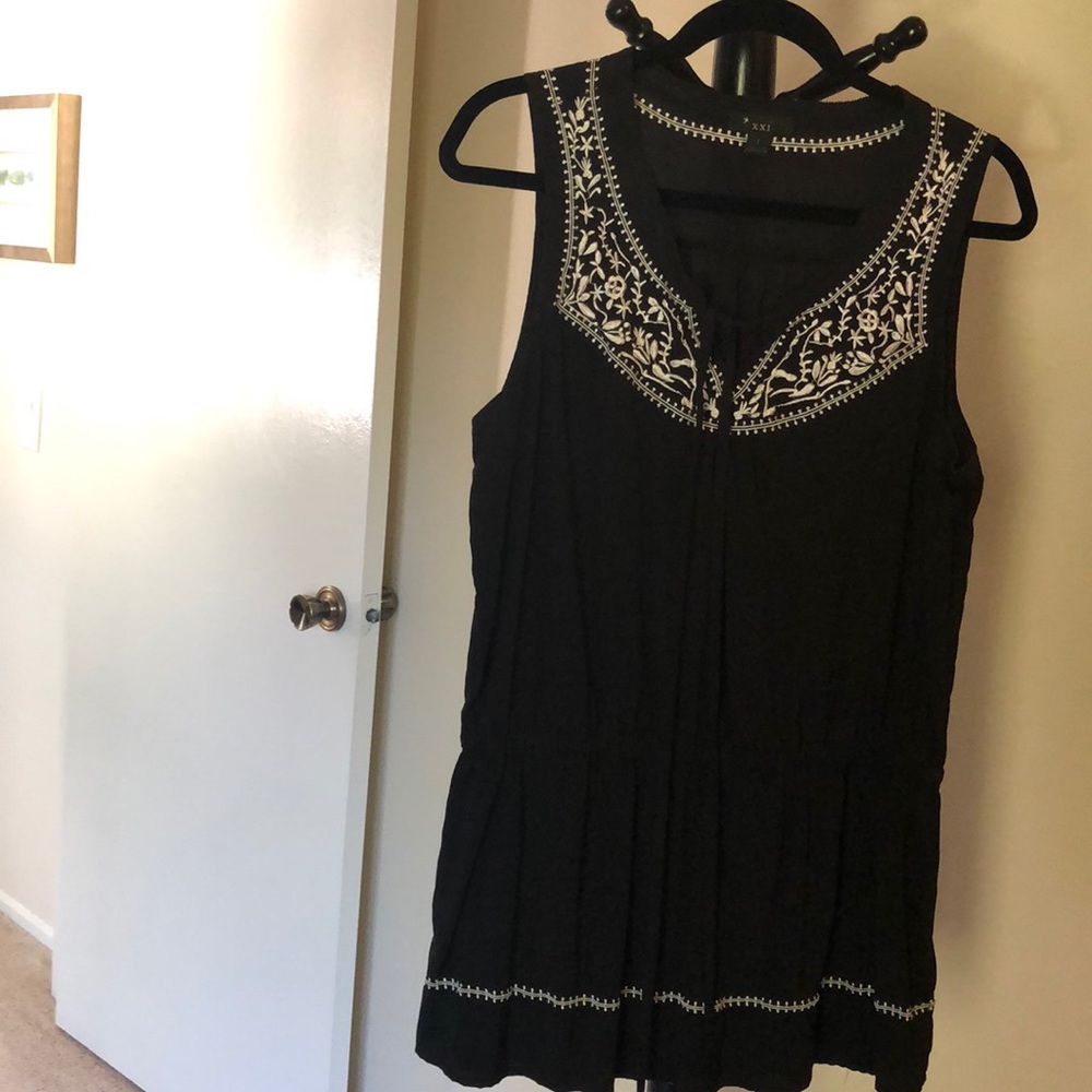 Black sleeveless top with embroidery